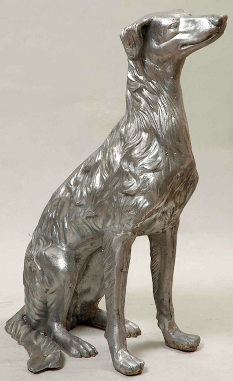 cast aluminum dog in sitting position