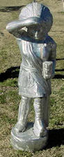 cast aluminum statue of an indian chief with head dress