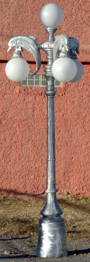 four light dolphin lamp post made from cast aluminum with 3 dolphin lamps